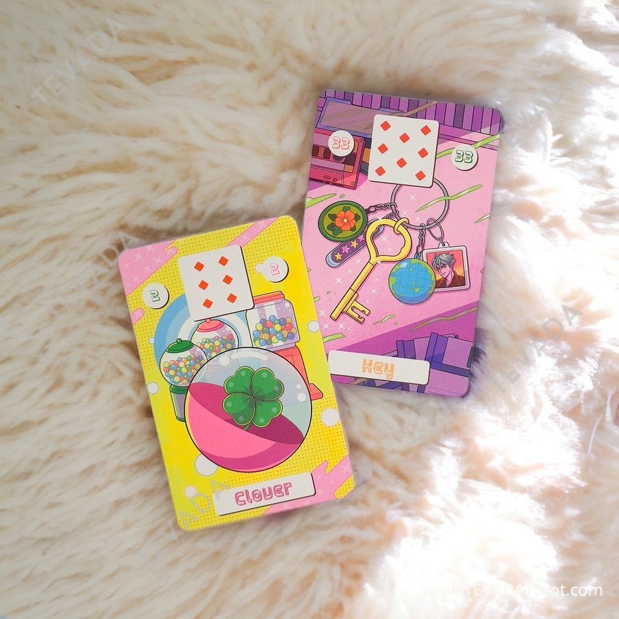 Experience the nostalgic allure of the Back to 80s Lenormand deck - a whimsical and intuitive cartoon tarot deck that brings vibrant 80s Japanese-style girls' comics to life!