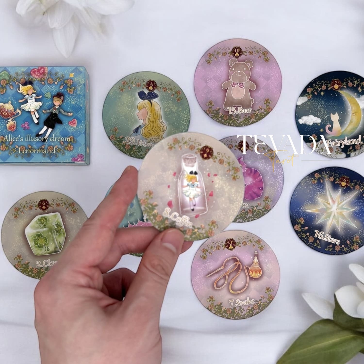 Unlock your intuition with Alice’s Illusory Dream Lenormand MINI deck. This 41-card set features a round size, blue-gilded edges and whimsical designs to guide your readings with magic and clarity.