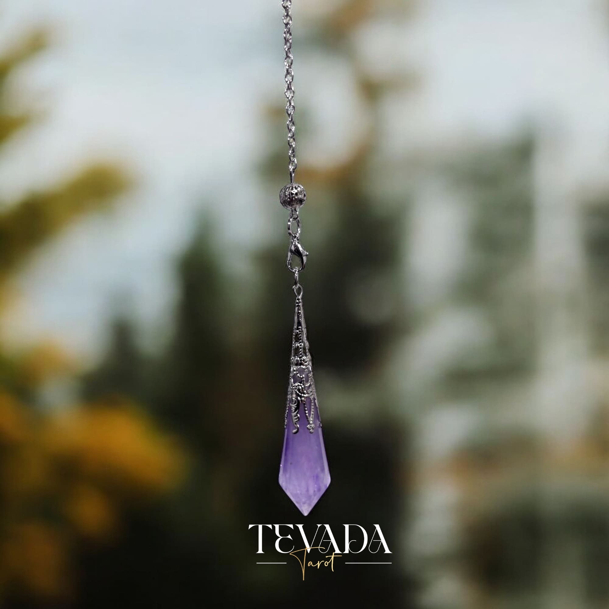 Healing Amethyst Pendulum Necklace in natural violet stone for anxiety relief and dowsing rituals.