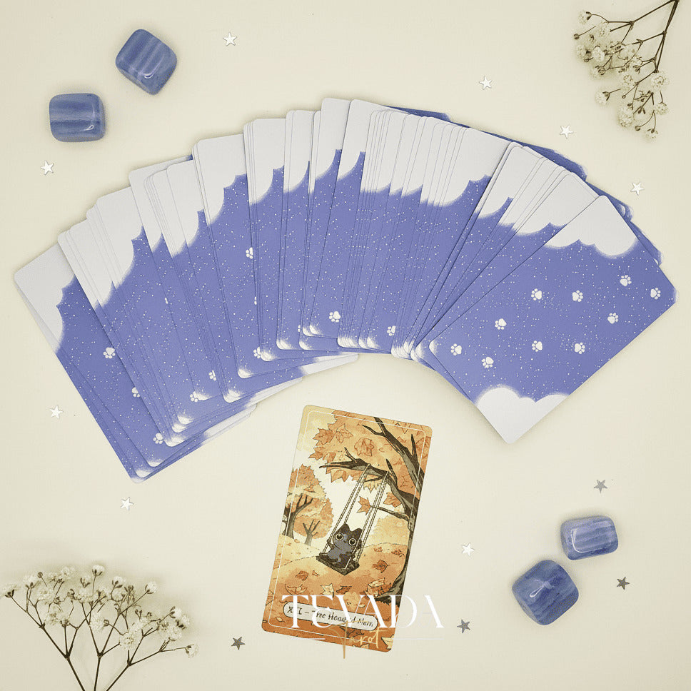 Catopia Tarot II featuring whimsical cat artwork on smooth cardstock for healing and playful divination.