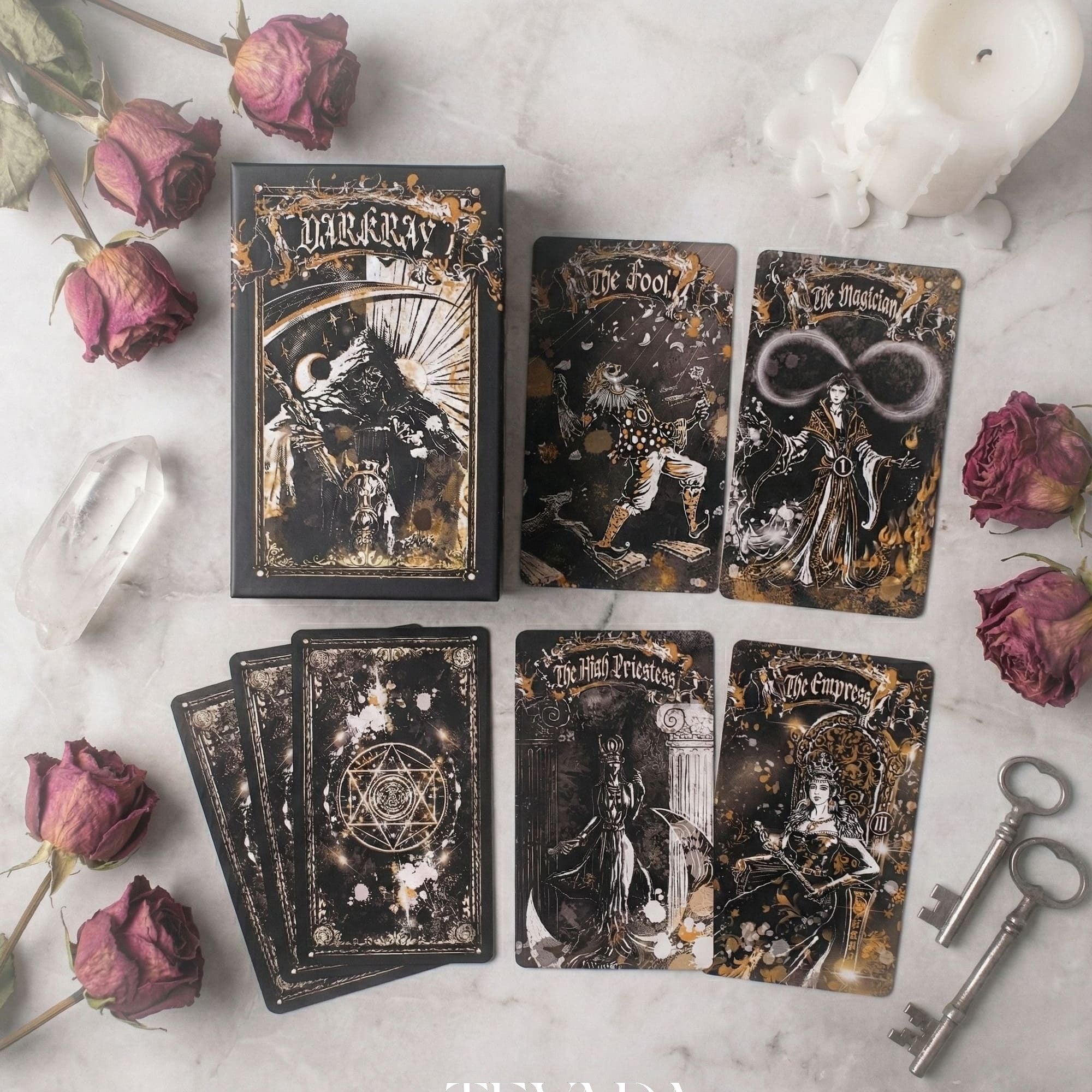 Unlock wisdom through the Dark Ray Tarot DELUXE, a 78-card deck in bold black, white, and gold tones designed for intuitive readings, clarity, and spiritual growth.