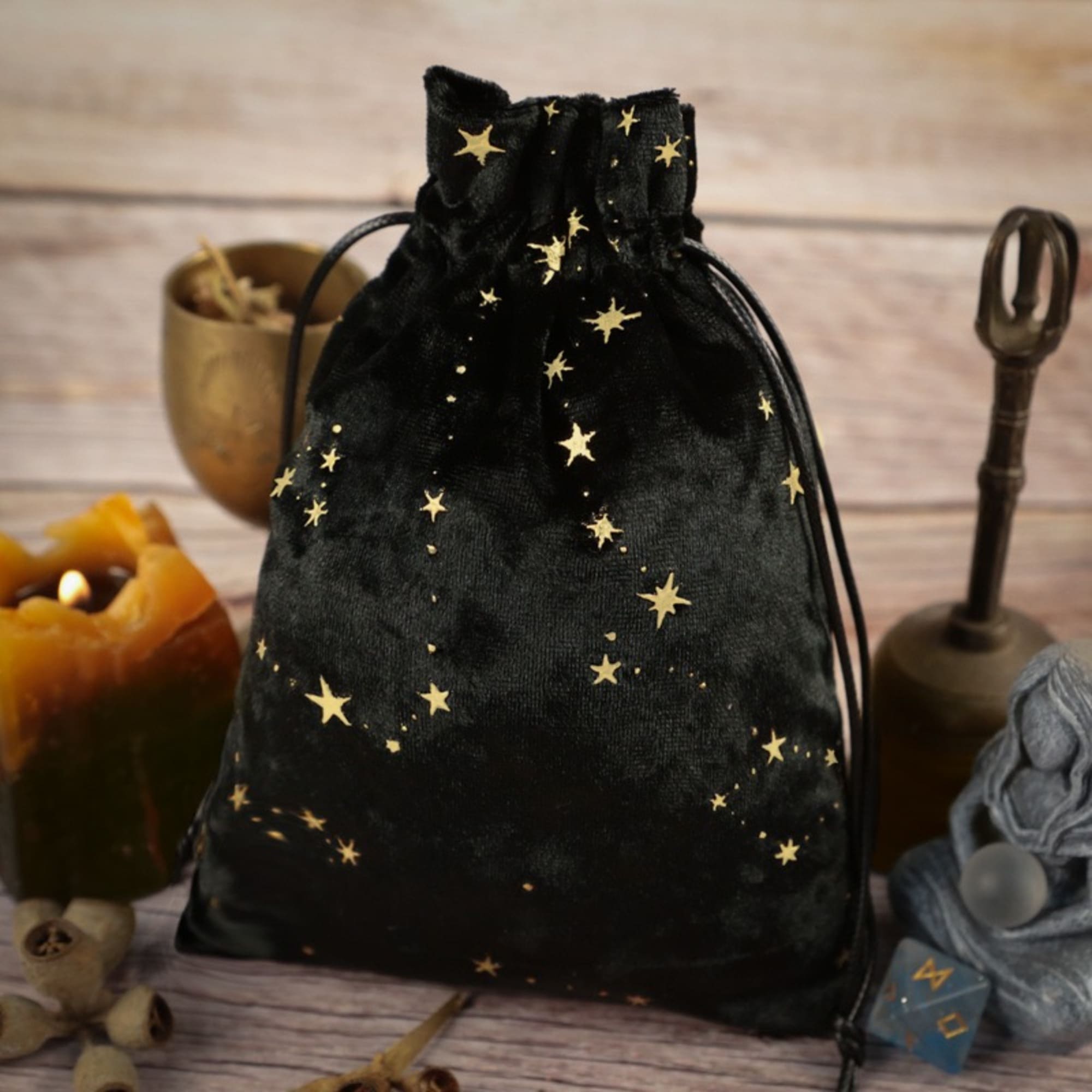 Celestial velvet tarot bag with golden stars for storing tarot decks, pendulums, or crystals. Perfect for Wiccan supplies, Pagan rituals, and spiritual protection on the go.