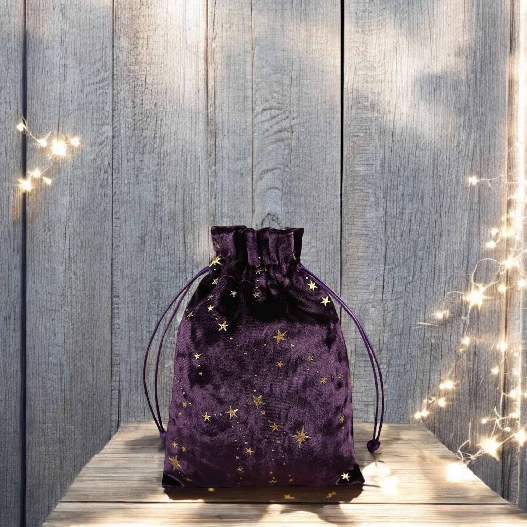 Celestial velvet tarot bag with golden stars for storing tarot decks, pendulums, or crystals. Perfect for Wiccan supplies, Pagan rituals, and spiritual protection on the go.