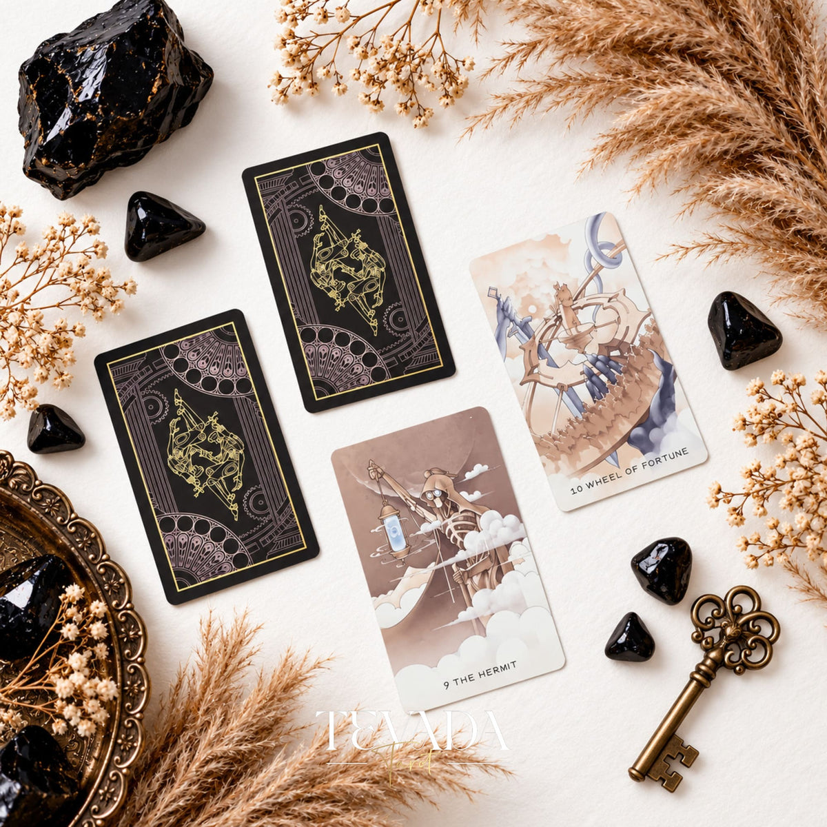 Ethereal Poetry Tarot Deluxe dark ornate card backs beside two illustrated card fronts, with black crystals and an antique-style key.