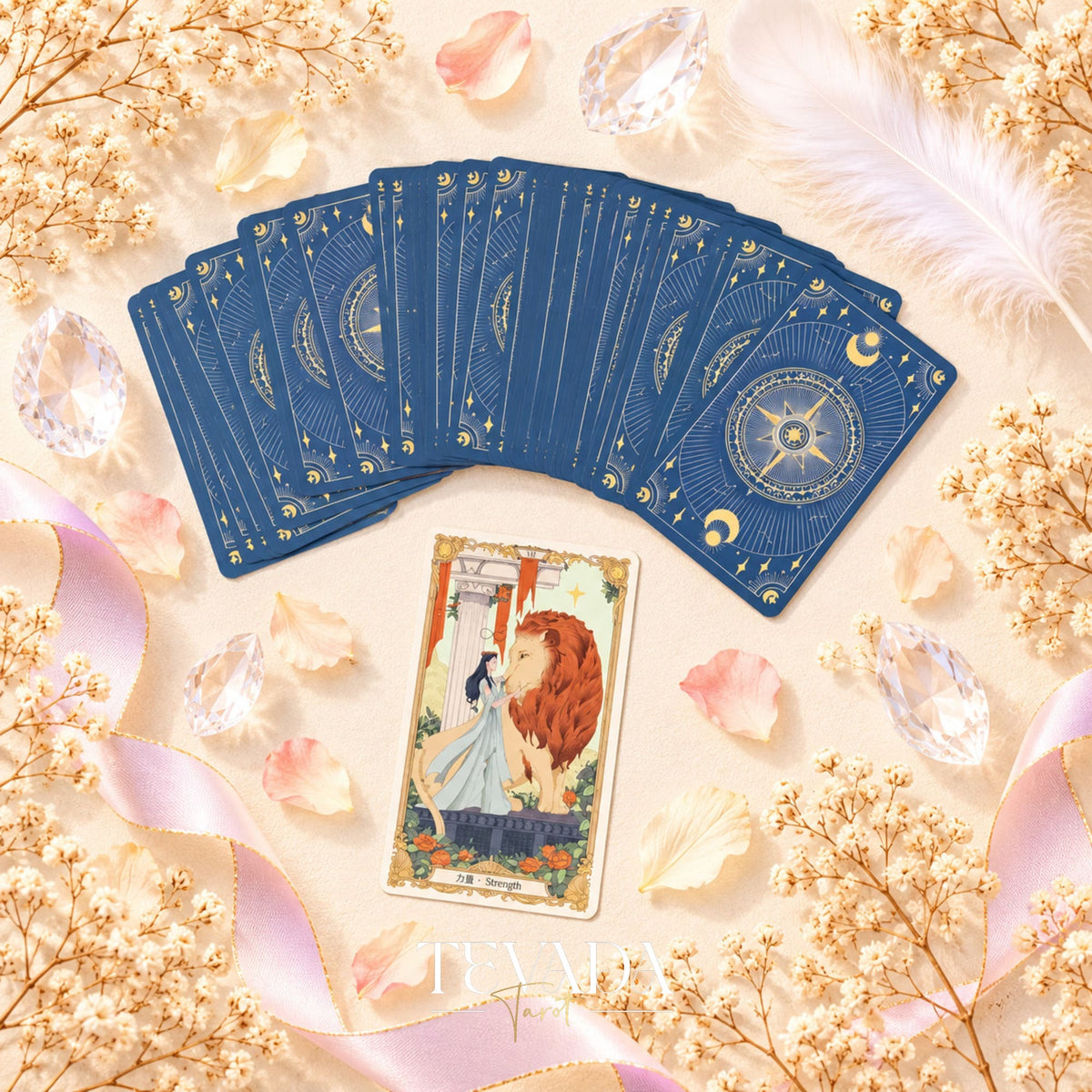 The Covenant Tarot blue celestial card backs fanned above a Wheel of Fortune card on a pink floral background.