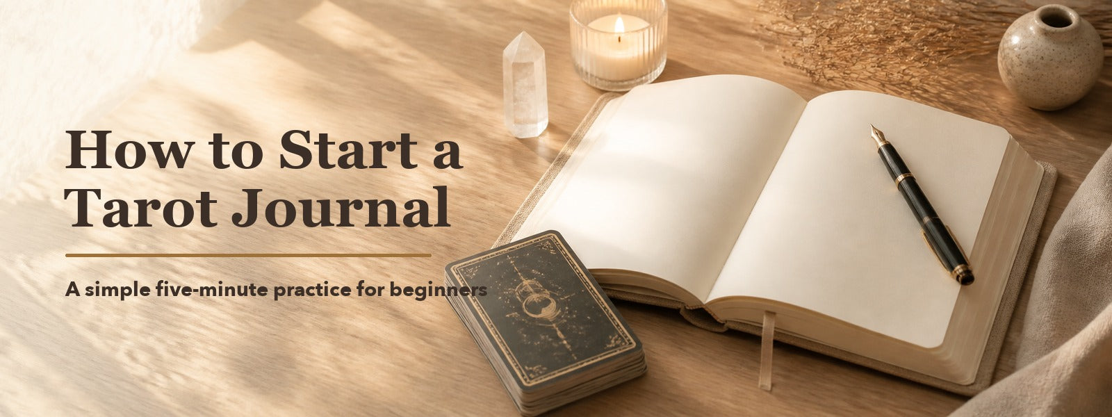 Open tarot journal, deck, pen, candle, and crystal in warm natural light for a beginner tarot journaling practice.
