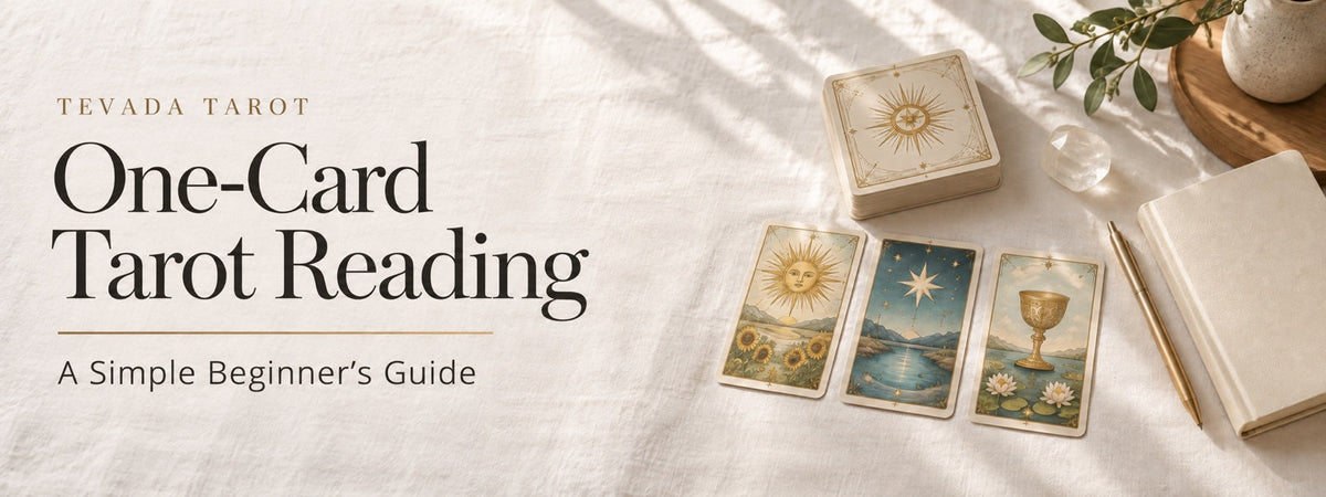 One-card tarot reading for beginners with a sun, star, and cup card, journal, brass pen, and quartz on ivory linen.