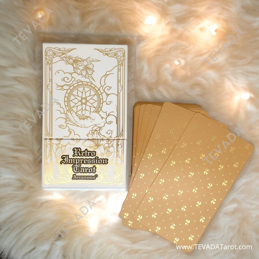 Unlock the mystical allure of Retro Impression Tarot LIMITED. Limited edition deck with captivating Art Nouveau designs featuring stunning golden stamping on white. Explore the profound connections between nature and divination.