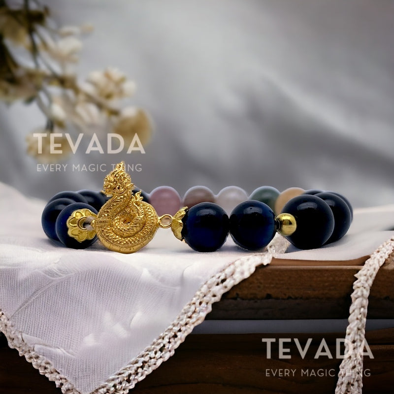 Embrace power and protection with the GOLDEN NAGA Lucky Beads Gemstone Bracelet. Featuring Lapis Lazuli and Black Onyx, this bracelet is a symbol of strength and prosperity