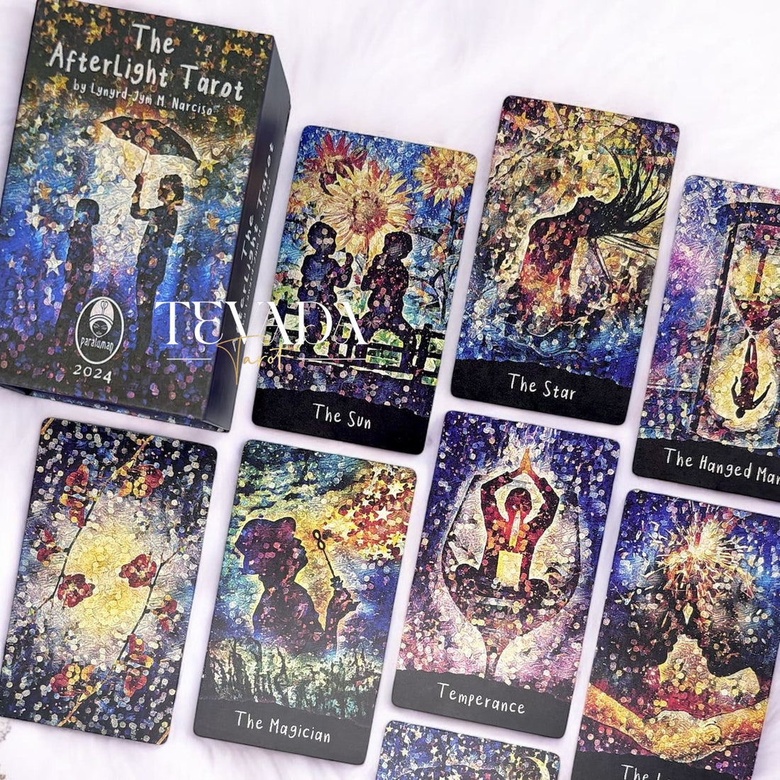 Experience intuitive guidance with The AfterLight Tarot. This 78-card deck blends Impressionist, Surrealist, and Magic-Realist art into a magical tool for self-discovery and transformation.