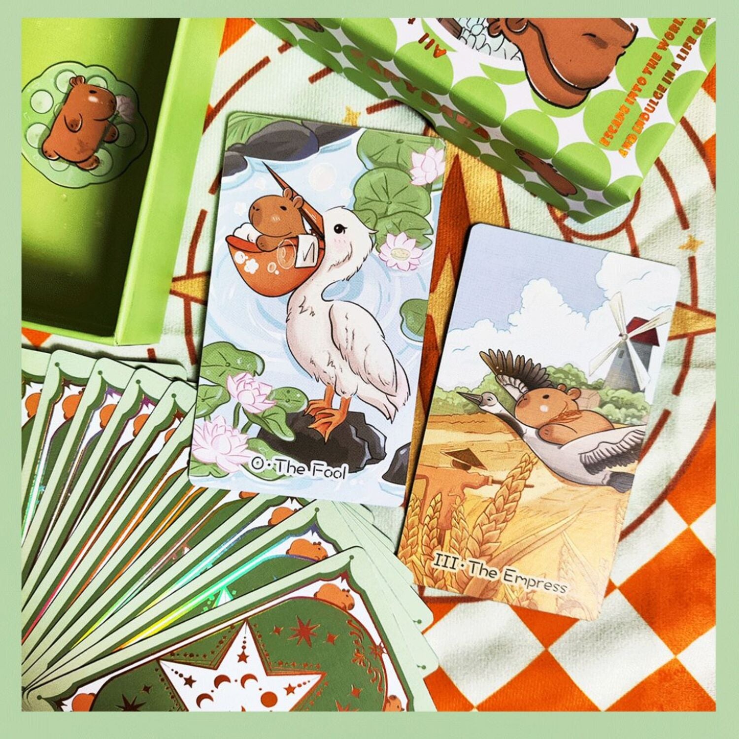 Find peace and clarity with Capybara Tarot Deluxe, a 78-card deck inspired by Buddhist wisdom. Let its soothing illustrations guide your readings toward balance, insight, and effortless flow.