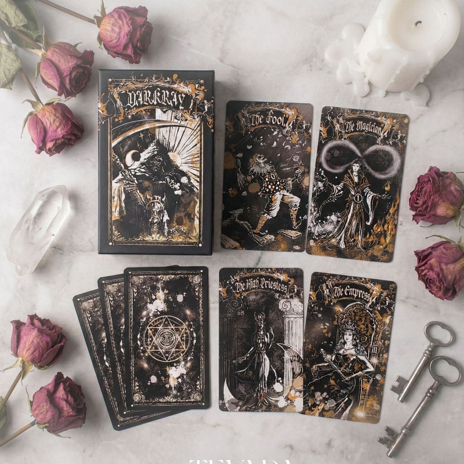 Unlock wisdom through the Dark Ray Tarot DELUXE, a 78-card deck in bold black, white, and gold tones designed for intuitive readings, clarity, and spiritual growth.