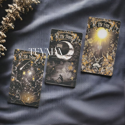Unlock wisdom through the Dark Ray Tarot DELUXE, a 78-card deck in bold black, white, and gold tones designed for intuitive readings, clarity, and spiritual growth.