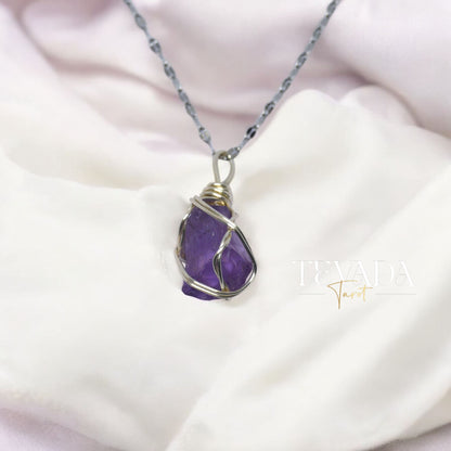 Enhance intuition and spiritual protection with the Amethyst Mystic Crystal Pendant Necklace. This radiant gemstone promotes calmness, psychic awareness, and healing energy, perfect for meditation and Reiki.