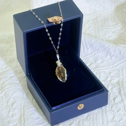 Stay grounded and protected with the Smoky Quartz Mystic Crystal Pendant Necklace. This energy-cleansing gemstone shields negativity, relieves stress, and enhances stability for spiritual balance and healing.