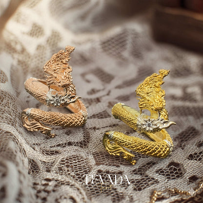 Discover the Naga Devine Dragon Charm Ring, a blend of Thai spirituality and elegance. Imbued with good luck and fortune, this 24K gold-plated amulet is a symbol of protection and prosperity. Embrace mystical charm!