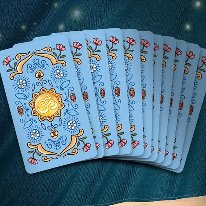 Discover divine guidance with the Om MahaRueyThep Tarot Deck. 78 cards inspired by Hindu gods, designed for wealth and prosperity. Perfect for spiritual seekers.
