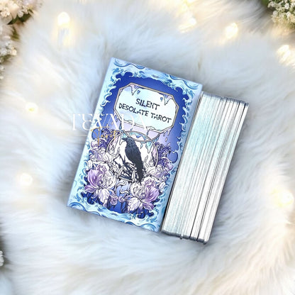 Unlock your intuition with the Silent Desolate Tarot DELUXE. This enchanting 78-card deck features whimsical, hand-drawn art, perfect for divination and personal growth. Discover clarity and magic!