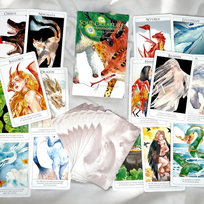 Discover the Soul Creatures Oracle, a 48-card deck illustrated in watercolor style, featuring mythical creatures. Perfect for intuitive guidance, personal growth, and magical reflections.