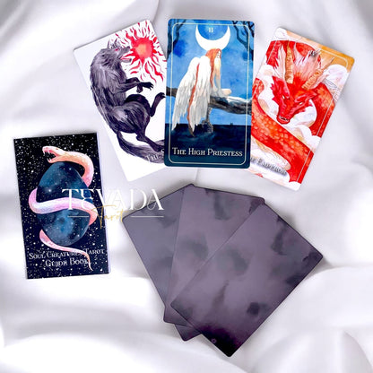 Unleash your intuition with the Soul Creatures Tarot. This stunning 78-card deck features hand-painted watercolor art inspired by global myths, guiding your spiritual journey and self-discovery.