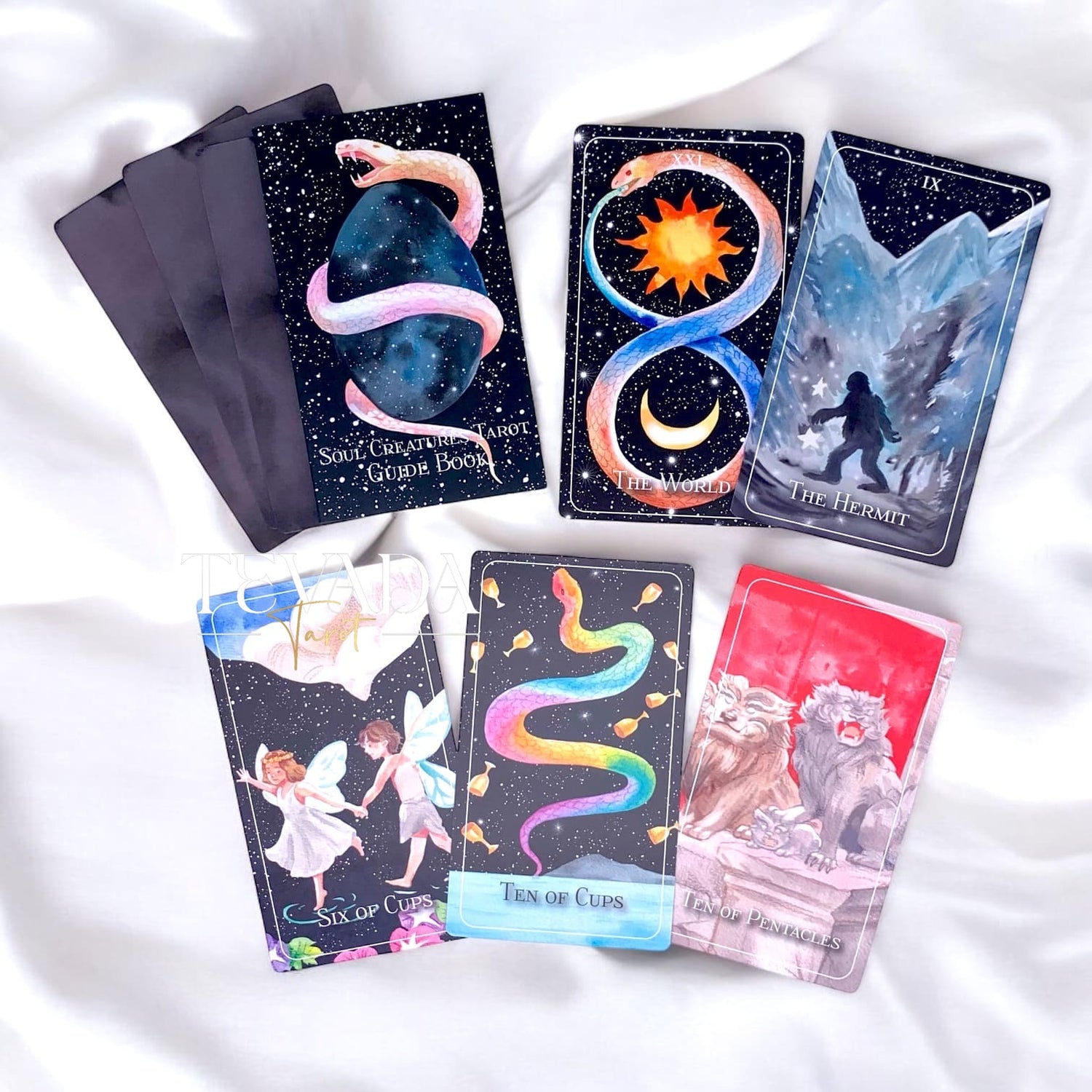 Unleash your intuition with the Soul Creatures Tarot. This stunning 78-card deck features hand-painted watercolor art inspired by global myths, guiding your spiritual journey and self-discovery.