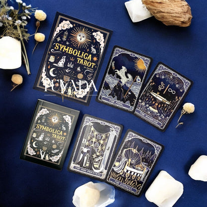 Discover Symbolica Tarot, a 78-card deck of timeless symbols with gold and silver accents. Unlock intuitive readings, clarity, and spiritual growth in every shuffle.