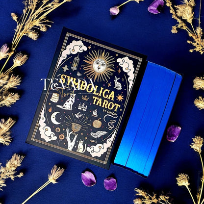 Discover Symbolica Tarot, a 78-card deck of timeless symbols with gold and silver accents. Unlock intuitive readings, clarity, and spiritual growth in every shuffle.
