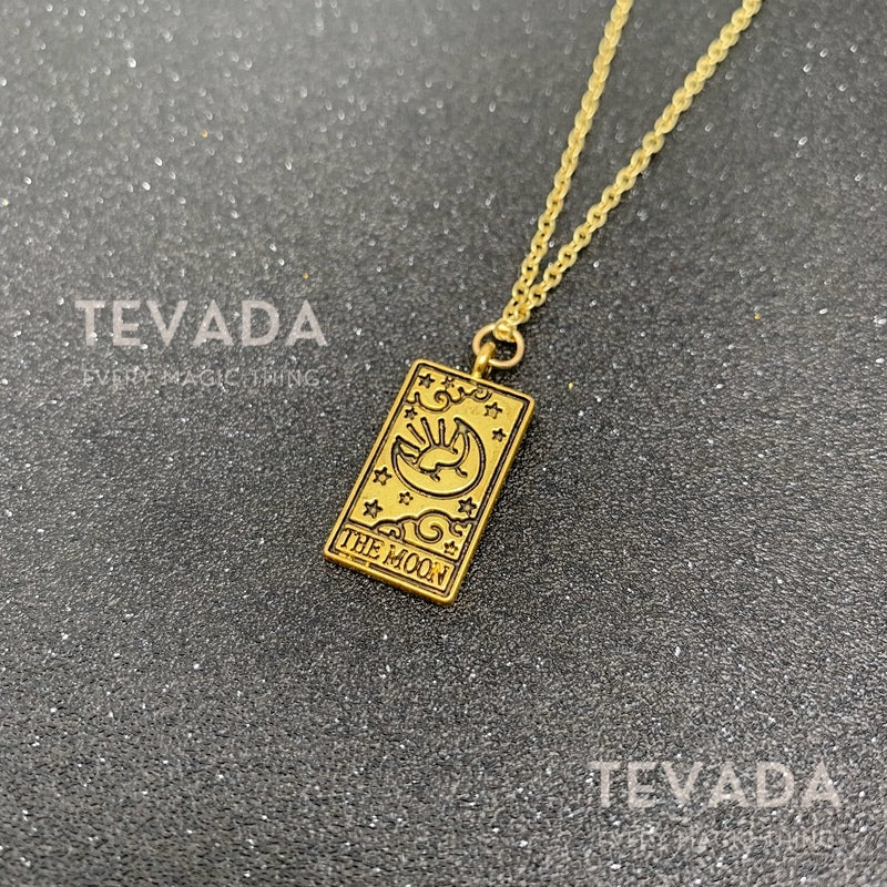 Unlock your intuition with our Tarot Necklace!  Featuring a Sun, Moon, or Star pendant, this handmade necklace is perfect for Wiccan rituals, meditation, and divination. Golden stainless steel chain included. Shop now!