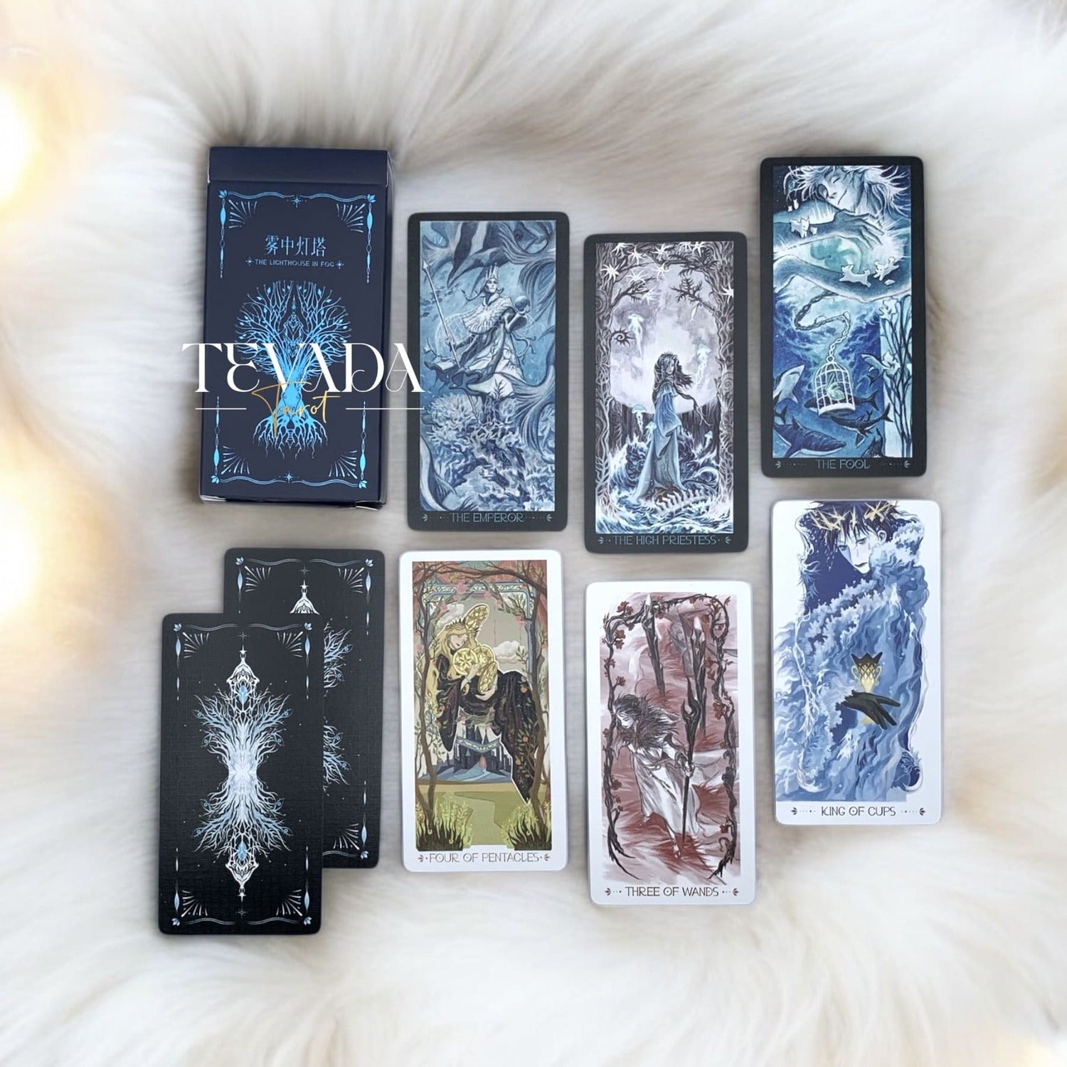 Discover intuitive guidance with the Lighthouse in Fog Tarot Pocket. A magical 78-card deck in black and blue hues, blending ancient legends and dreamlike imagery for profound divination.