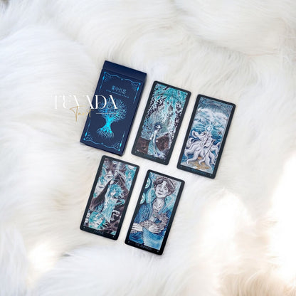 Discover intuitive guidance with the Lighthouse in Fog Tarot Pocket. A magical 78-card deck in black and blue hues, blending ancient legends and dreamlike imagery for profound divination.