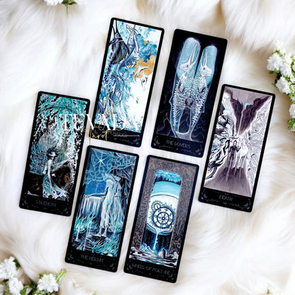 Discover the intuitive magic of The Lighthouse in Fog Tarot, a 78-card deck featuring stunning black and blue designs inspired by mystical ocean tales and ancient legends. Perfect for seekers of wisdom and clarity.