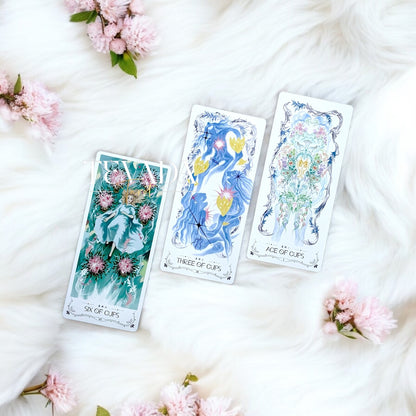 Discover the intuitive magic of The Lighthouse in Fog Tarot, a 78-card deck featuring stunning black and blue designs inspired by mystical ocean tales and ancient legends. Perfect for seekers of wisdom and clarity.