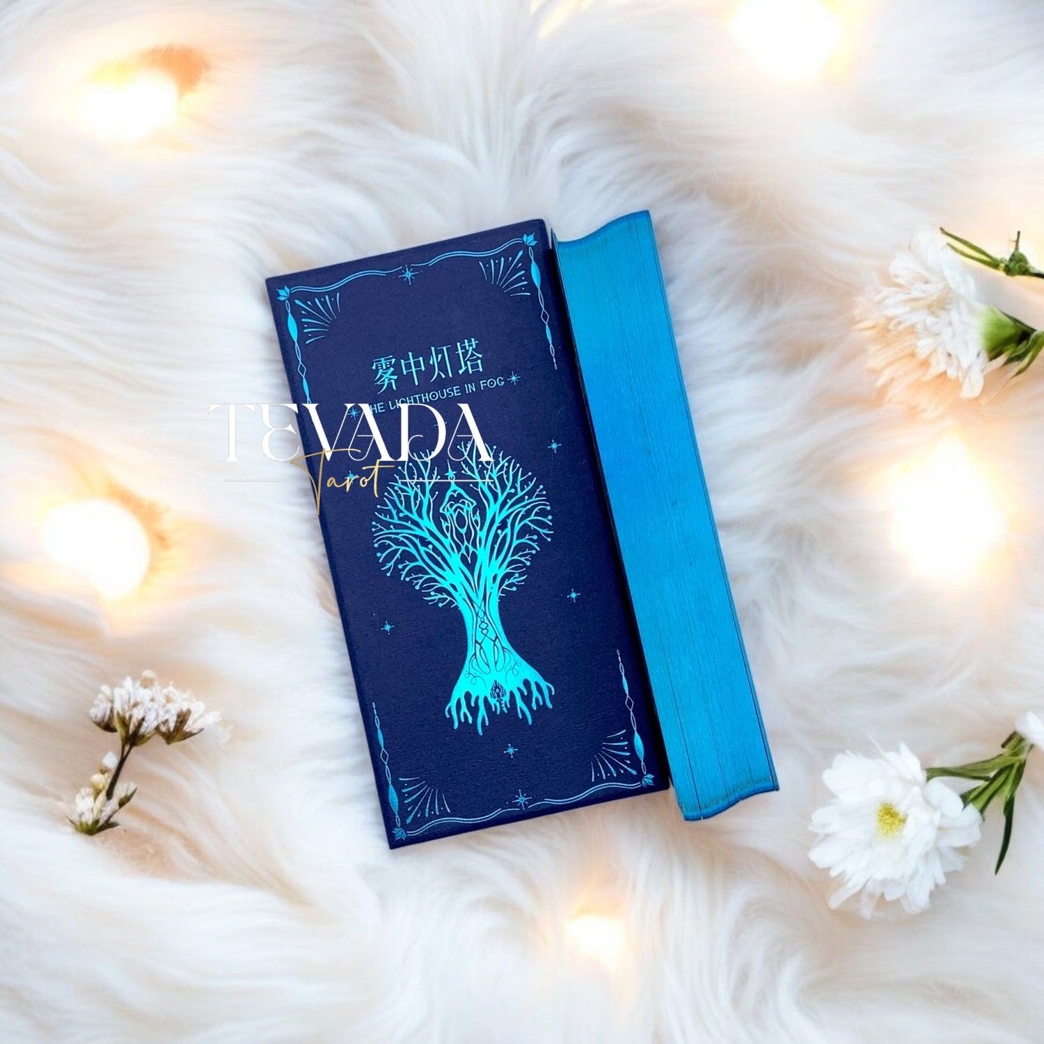 Discover the intuitive magic of The Lighthouse in Fog Tarot, a 78-card deck featuring stunning black and blue designs inspired by mystical ocean tales and ancient legends. Perfect for seekers of wisdom and clarity.