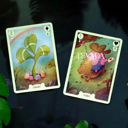 Discover the magical Tokfly Lenormand, a 36-card divination deck with cute slimes in a fantasy jungle, offering intuitive guidance for personal growth and clarity.