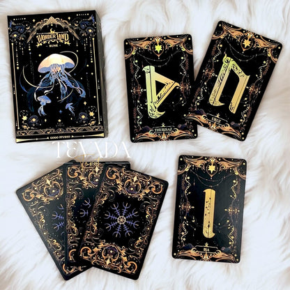 Unlock the secrets of the ancient world with Wonderland Runes. Featuring 27 gold-stamped cards, this deck offers intuitive guidance and insight into your spiritual journey.