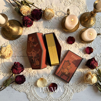 Aisling Tarot Gilded Edt featuring gothic violin art and coffin box for shadow work divination.
