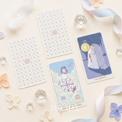 Ari Baby Tarot Deck whimsical pink cartoon indie tarot deck with foil pink edges for gentle inner child healing.