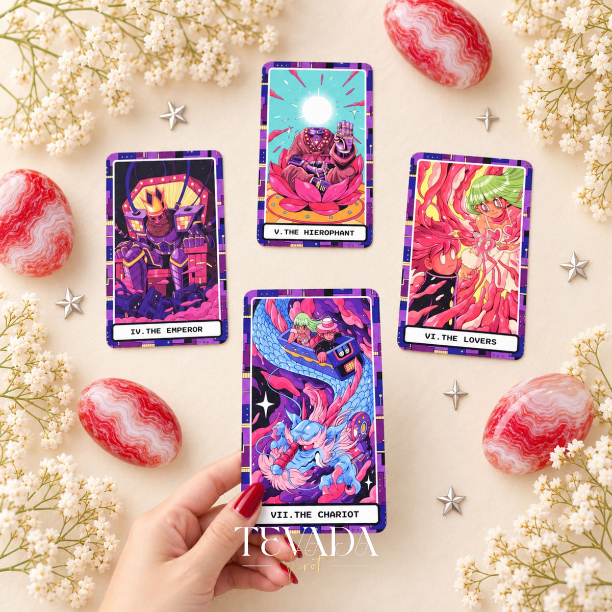 A hand holds The Chariot from At the Edge of the Galaxy Tarot, with The Emperor, The Hierophant and The Lovers behind it.