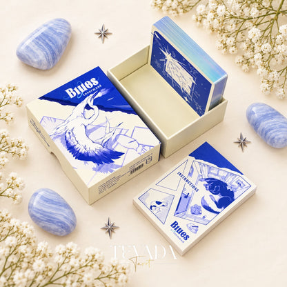 The Blues Lenormand Deck box and blue-and-white illustrated cards arranged with blue agate stones, star accents and white blossoms.