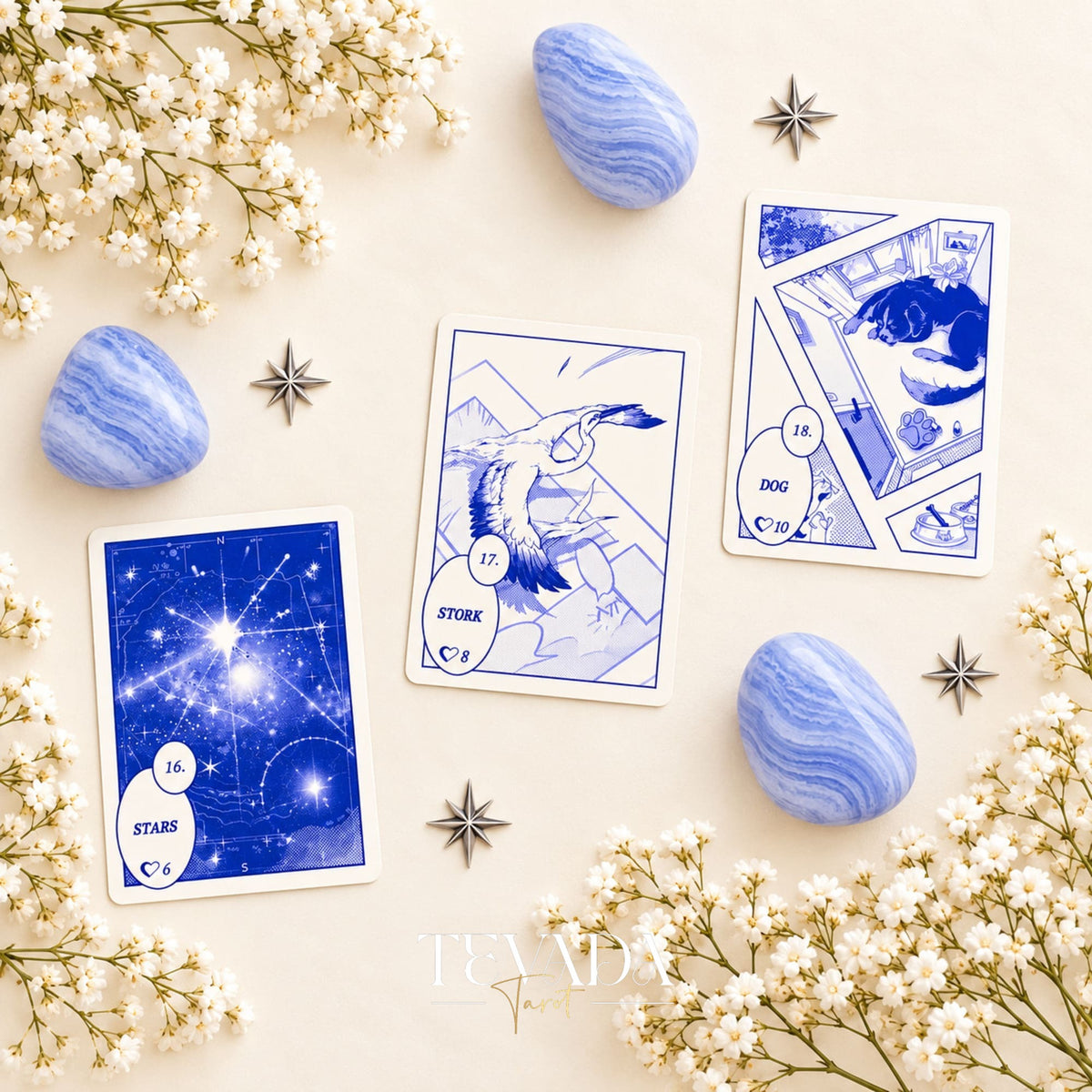 The Garden and Mountain Lenormand cards, numbered 20 and 21, shown with blue agate stones and white flowers.
