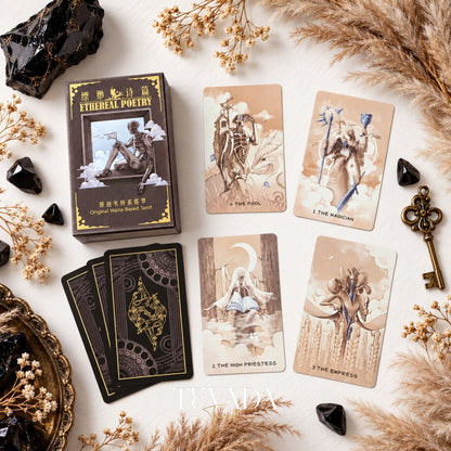 Ethereal Poetry Tarot Deluxe box with sepia illustrated card fronts and dark ornate card backs, surrounded by black crystals and dried grasses.