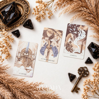 Three surreal sepia tarot card fronts from Ethereal Poetry Tarot Deluxe arranged with black crystals and dried grasses.