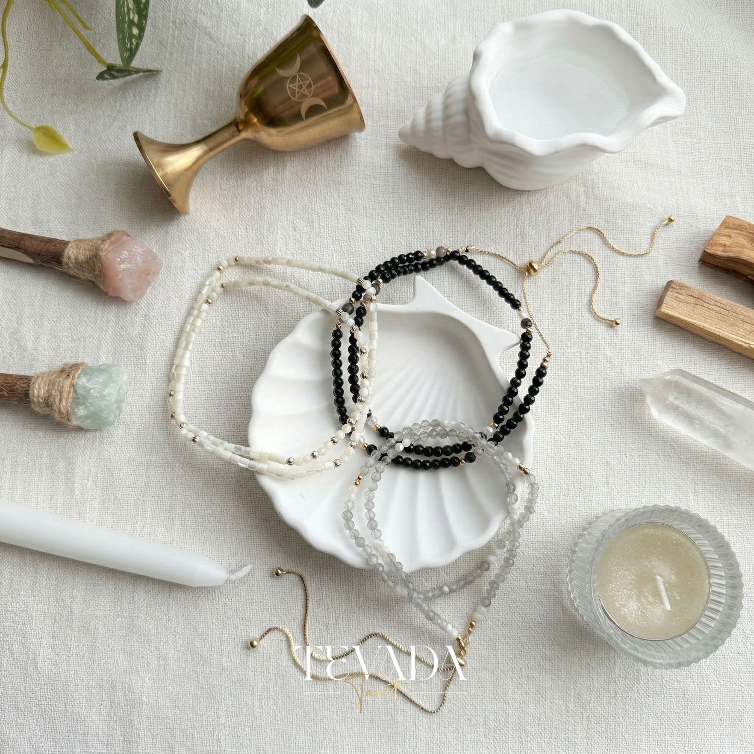 Hand-made Crystal Bracelet in Black Obsidian, Moonstone, and Shell Stone for grounding energy and daily spiritual practice.