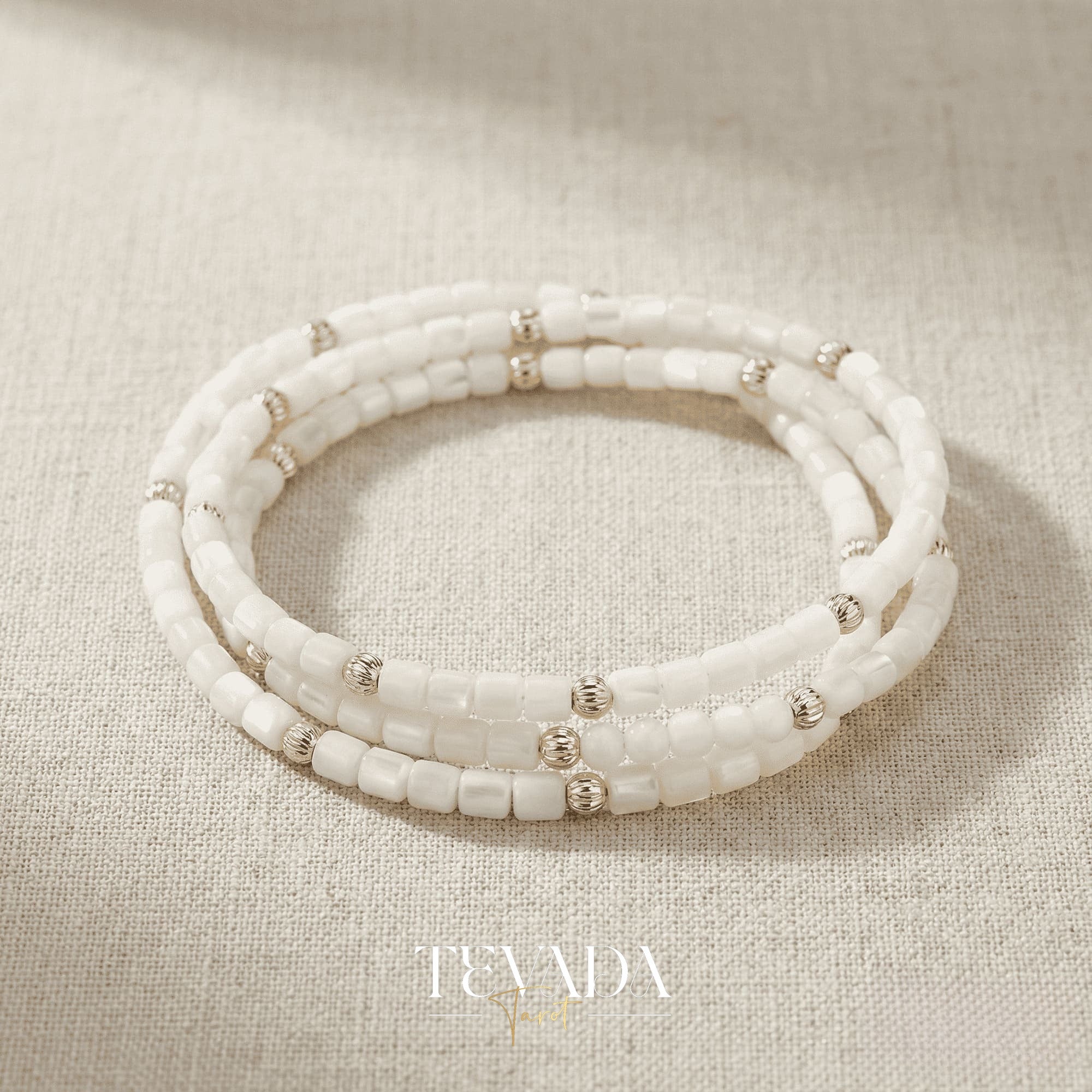 Hand-made Crystal Bracelet in Black Obsidian, Moonstone, and Shell Stone for grounding energy and daily spiritual practice.