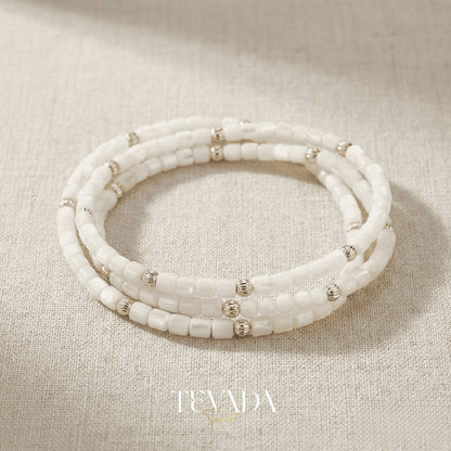 Hand-made Crystal Bracelet in Black Obsidian, Moonstone, and Shell Stone for grounding energy and daily spiritual practice.