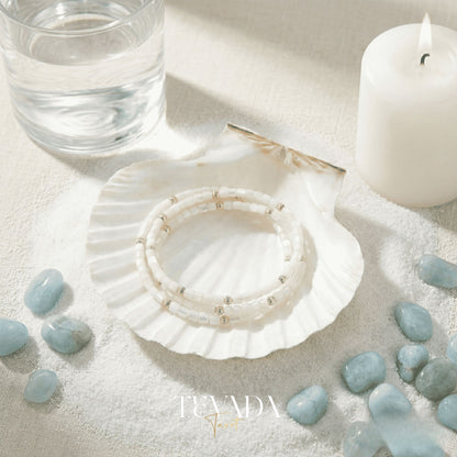 Hand-made Crystal Bracelet in Black Obsidian, Moonstone, and Shell Stone for grounding energy and daily spiritual practice.