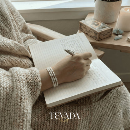 Hand-made Crystal Bracelet in Black Obsidian, Moonstone, and Shell Stone for grounding energy and daily spiritual practice.