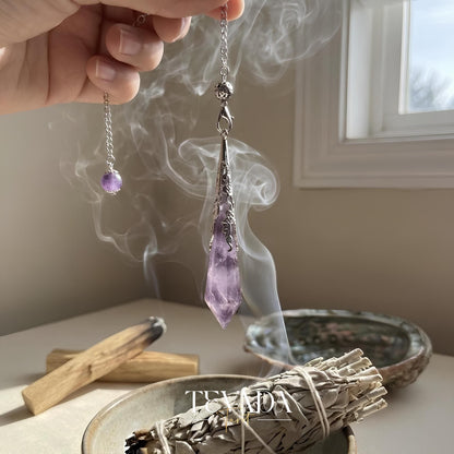 Healing Amethyst Pendulum Necklace in natural violet stone for anxiety relief and dowsing rituals.