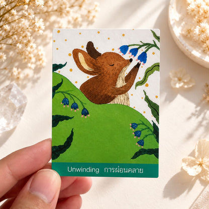 Close-up of the Heard Oracle Unwinding card showing a fox resting on a green hillside.