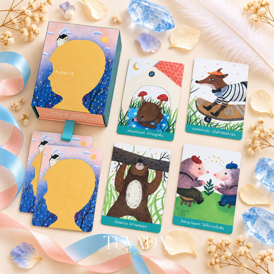 Heard Oracle box, card backs, and four illustrated cards featuring animals.
